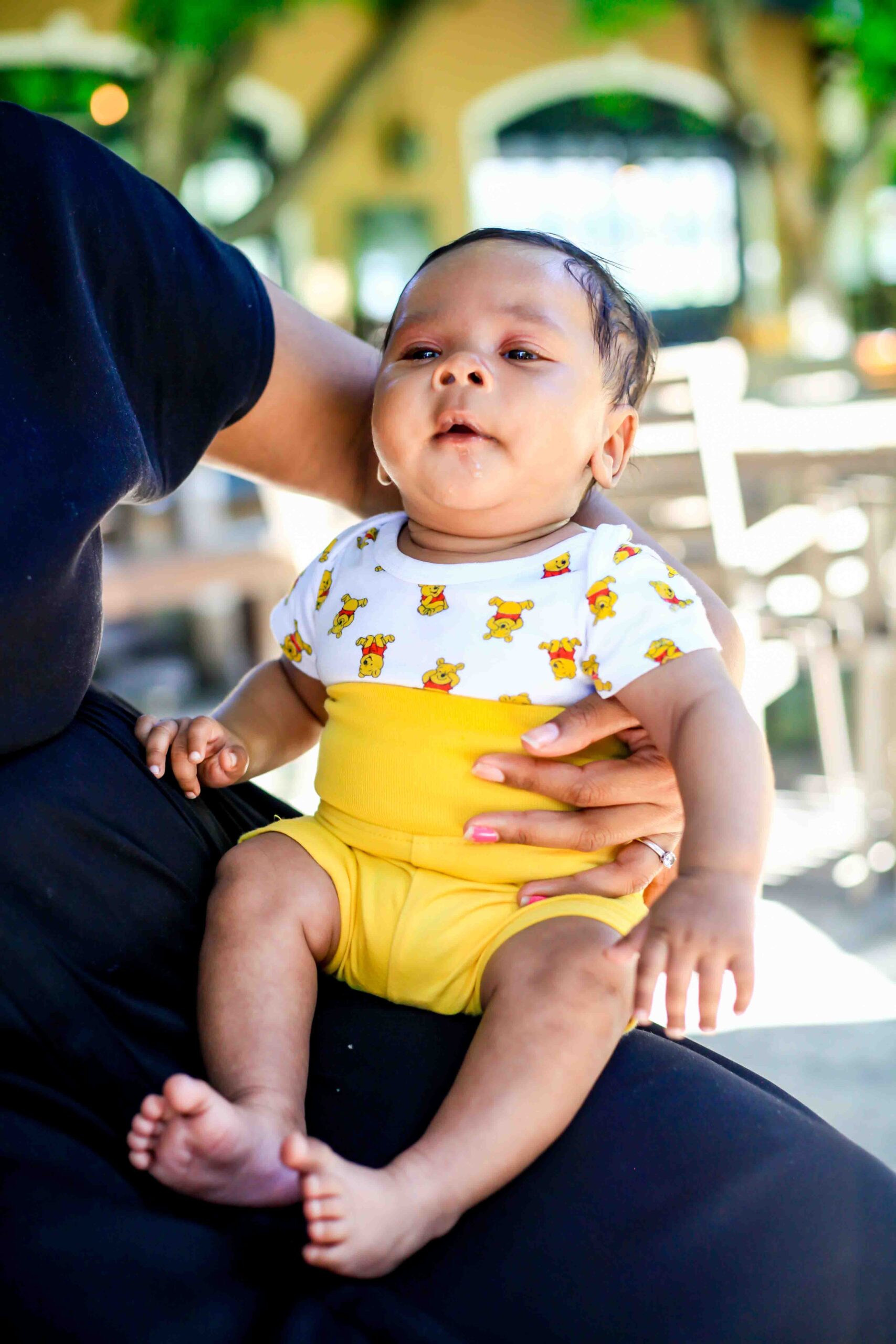 Above & Beyond Nanny caring for new born baby